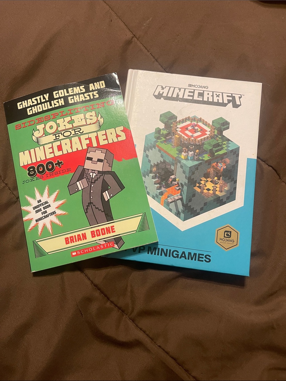 2 Minecraft books- Minigames Book White & Blue Cover